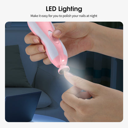 Parent using electric baby nail trimmer with LED front light to safely groom baby nails