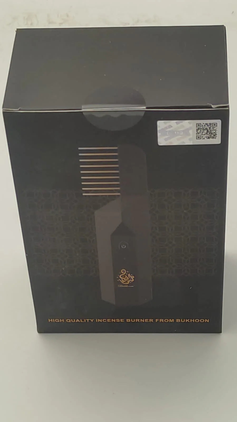 Black box with an incense burner design on a white background