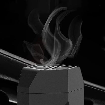 Car air freshener with smoke release mechanism on a black background