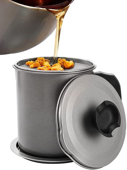 Pouring Cooking Oil into Stainless Steel Grease Container
